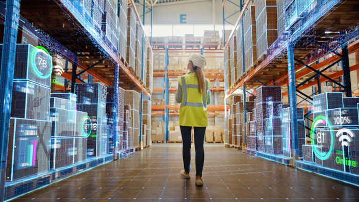 Futuristic Technology Retail Warehouse: Worker Doing Inventory Walks when Digitalization Process Analyzes Goods